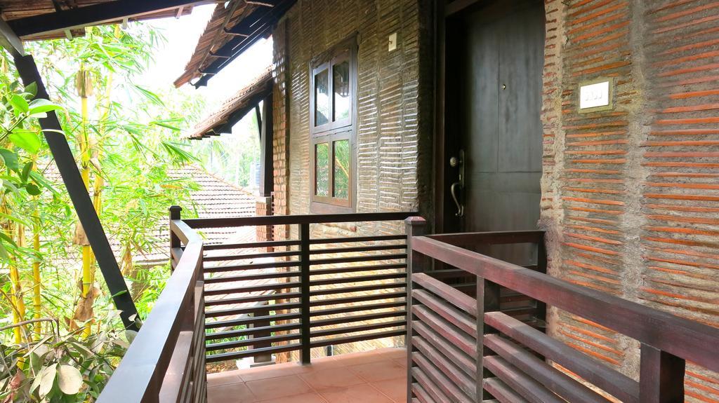 Clayfingers Art Cottage Thrissur Rom bilde